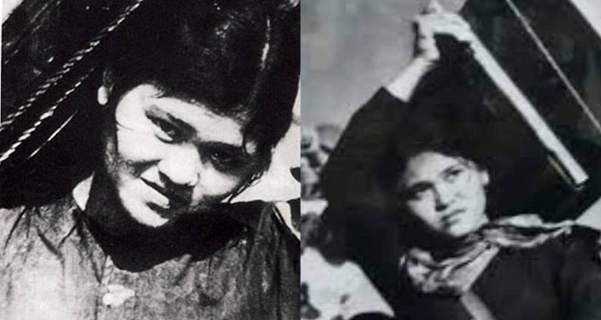 Hình ảnh nữ dân quân Ngô Thị Tuyển vác 2 hòm đạn