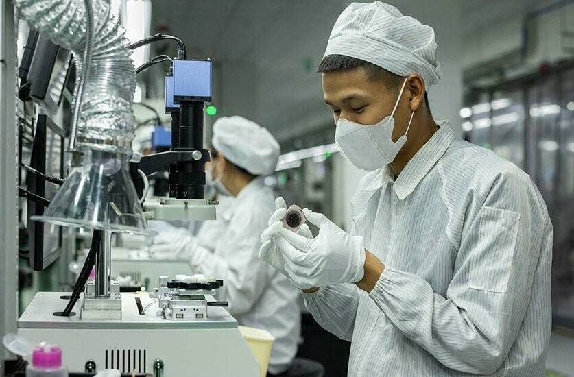   Một dây chuyền kiểm tra iPad tại Việt Nam. Ảnh: Apple. 