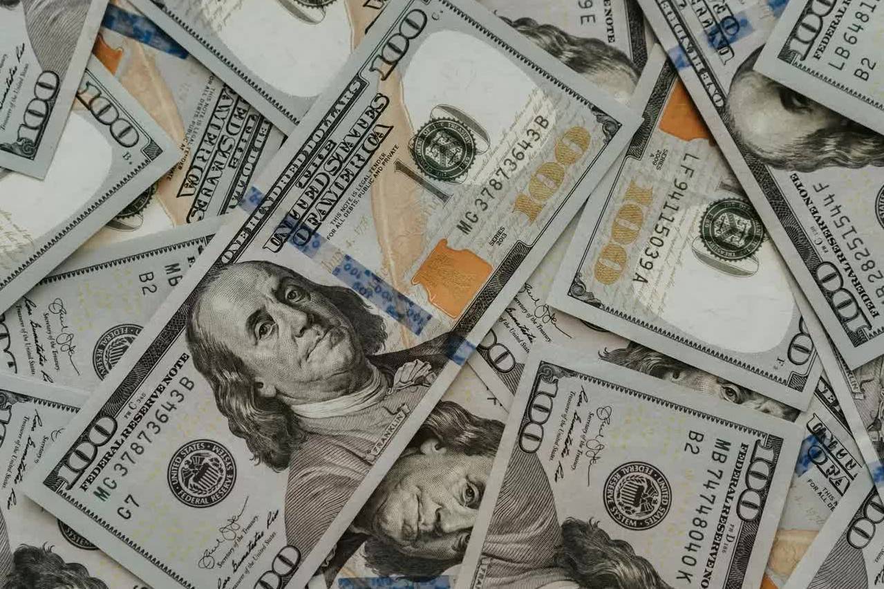 Đồng USD trên đà tăng tuần thứ hai nhờ sức chống chịu của kinh tế Mỹ