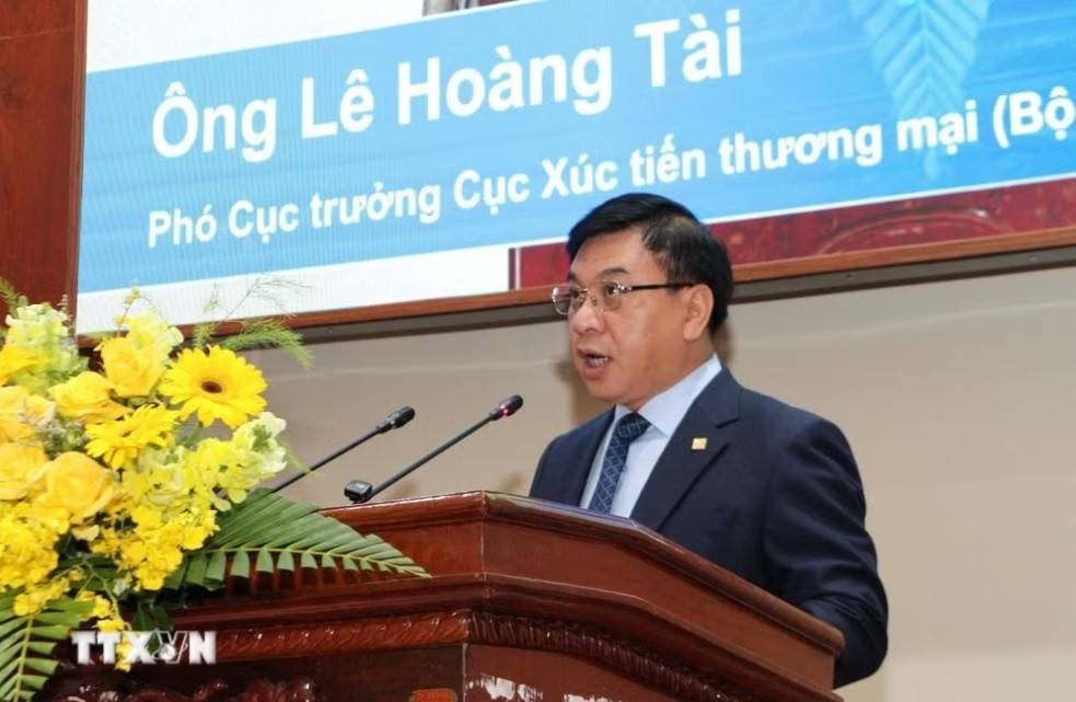 Ông Lê Hoàng Tài - Phó Cục trưởng Cục Xúc tiến thương mại phát biểu tại Hội nghị (Ảnh: Hồng Thái/TTXVN).