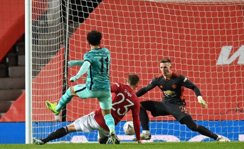 Salah ghi c&amp;uacute; đ&amp;uacute;p nhưng kh&amp;ocirc;ng thể gi&amp;uacute;p Liverpool tho&amp;aacute;t thua. Ảnh: FA.