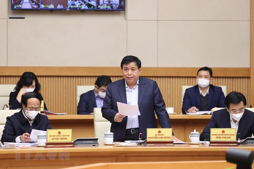 Bộ trưởng Bộ Kế hoạch v&amp;agrave; Đầu tư Nguyễn Ch&amp;iacute; Dũng tr&amp;igrave;nh b&amp;agrave;y b&amp;aacute;o c&amp;aacute;o. (Ảnh: Dương Giang/TTXVN)
