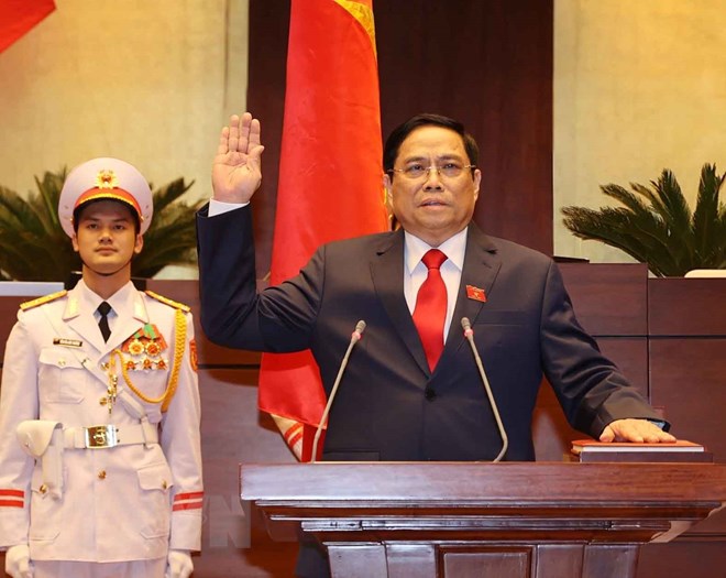 Thủ tướng Phạm Minh Ch&amp;iacute;nh tuy&amp;ecirc;n thệ nhậm chức trước Quốc hội, đồng b&amp;agrave;o v&amp;agrave; cử tri cả nước. (Ảnh: Thống Nhất/TTXVN)