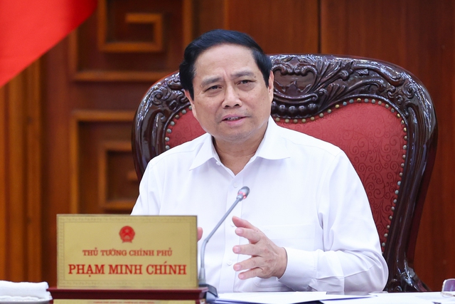 : Thủ tướng Phạm Minh Ch&amp;iacute;nh chủ tr&amp;igrave; cuộc họp th&amp;aacute;o gỡ kh&amp;oacute; khăn, vướng mắc, th&amp;uacute;c đẩy ph&amp;aacute;t triển nh&amp;agrave; ở x&amp;atilde; hội chiều tối ng&amp;agrave;y 17/5 - Ảnh: TTXVN