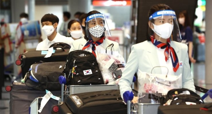 Ph&amp;aacute;i đo&amp;agrave;n Olympic của H&amp;agrave;n Quốc đến s&amp;acirc;n bay quốc tế Narita ở Nhật Bản, ng&amp;agrave;y 19 th&amp;aacute;ng 7
