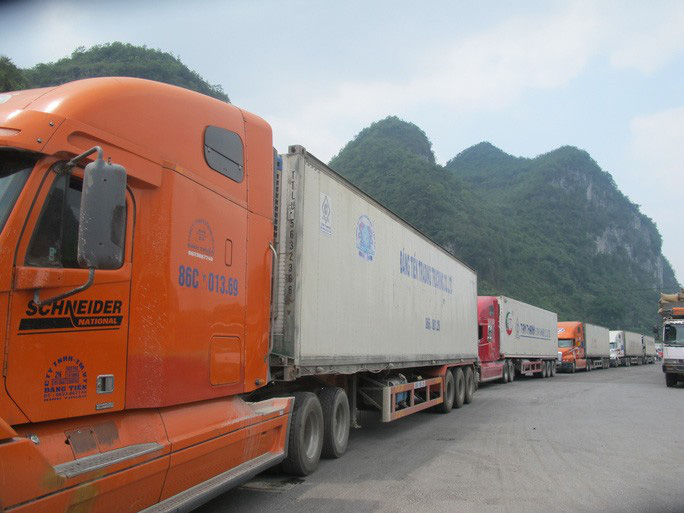 Kinh tế Việt Nam ứng ph&amp;oacute; dịch bệnh corona - Ảnh 1.