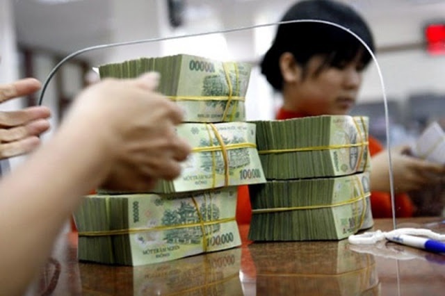 L&amp;atilde;i suất ng&amp;acirc;n h&amp;agrave;ng đồng loạt giảm tiếp - 1