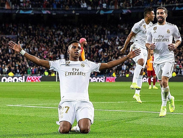 Rodrygo mừng những b&amp;amp;agrave;n thắng đầu ti&amp;amp;ecirc;n tại Champions League. Ảnh: EPA.