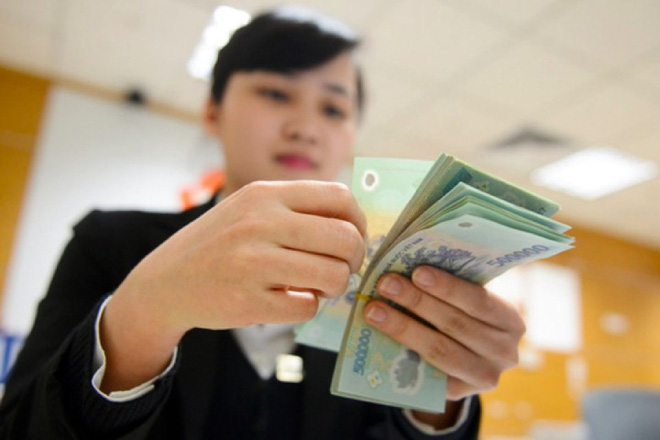 Tiền thưởng Tết bị trừ thuế ra sao m&amp;agrave; d&amp;acirc;n c&amp;ocirc;ng sở ấm ức đến vậy? - Ảnh 1.