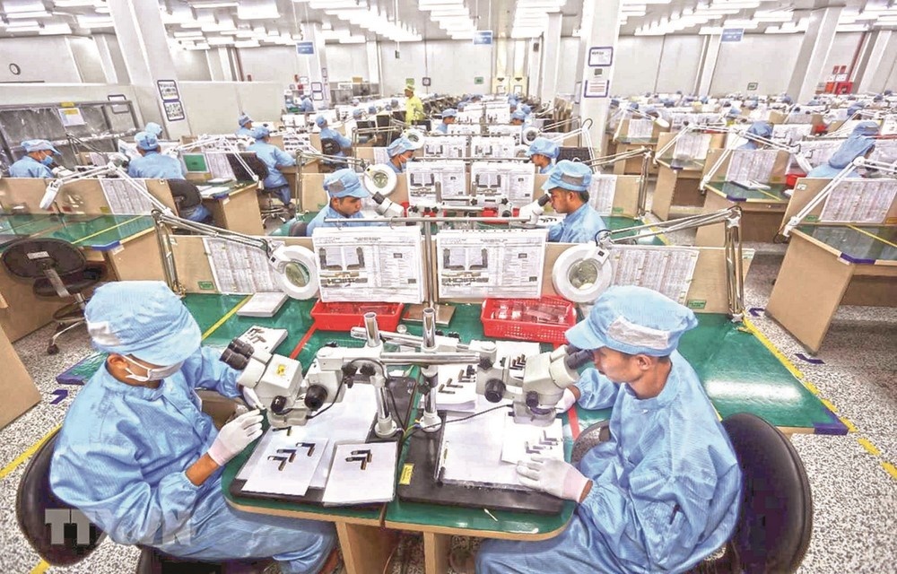 Ch&amp;iacute;nh quyền v&amp;agrave; doanh nghiệp chung tay th&amp;aacute;o gỡ kh&amp;oacute; khăn, vượt qua dịch bệnh, phục hồi sản xuất/ Ảnh TTXVN