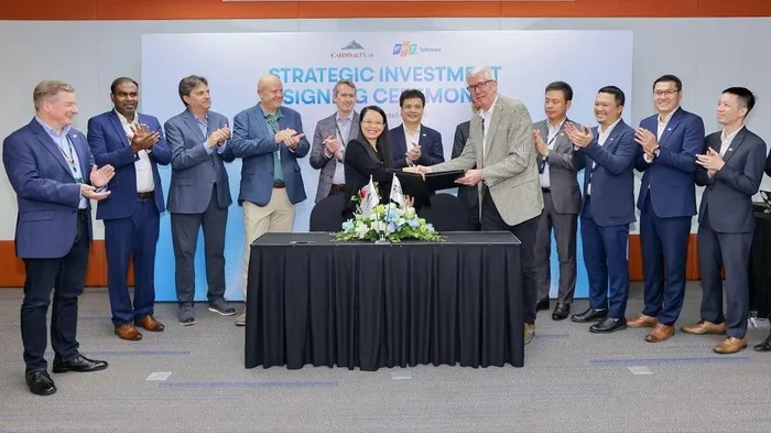 L&amp;atilde;nh đạo FPT v&amp;agrave; Cardinal Peak tại lễ k&amp;yacute; kết đầu tư chiến lược