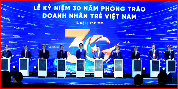 Thủ tướng v&amp;agrave; c&amp;aacute;c đại biểu thực hiện nghi thức nhấn n&amp;uacute;t kỷ niệm 30 năm phong tr&amp;agrave;o doanh nh&amp;acirc;n trẻ Việt Nam